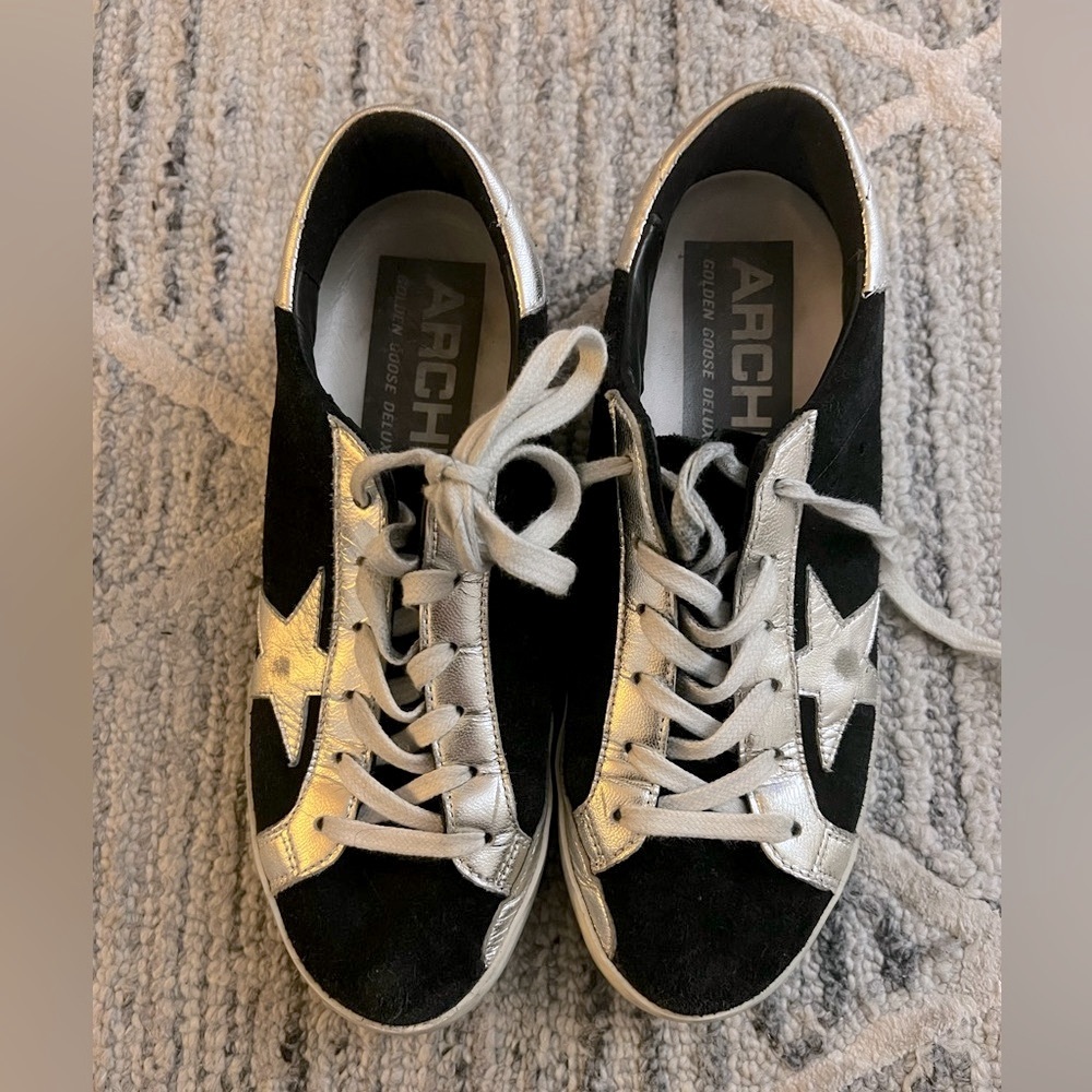 Golden goose low top black suede sneakers with silver star